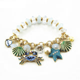 Bracelet Coquillage Perles, crabe, coquilles Saint-Jaques et étoile de mer